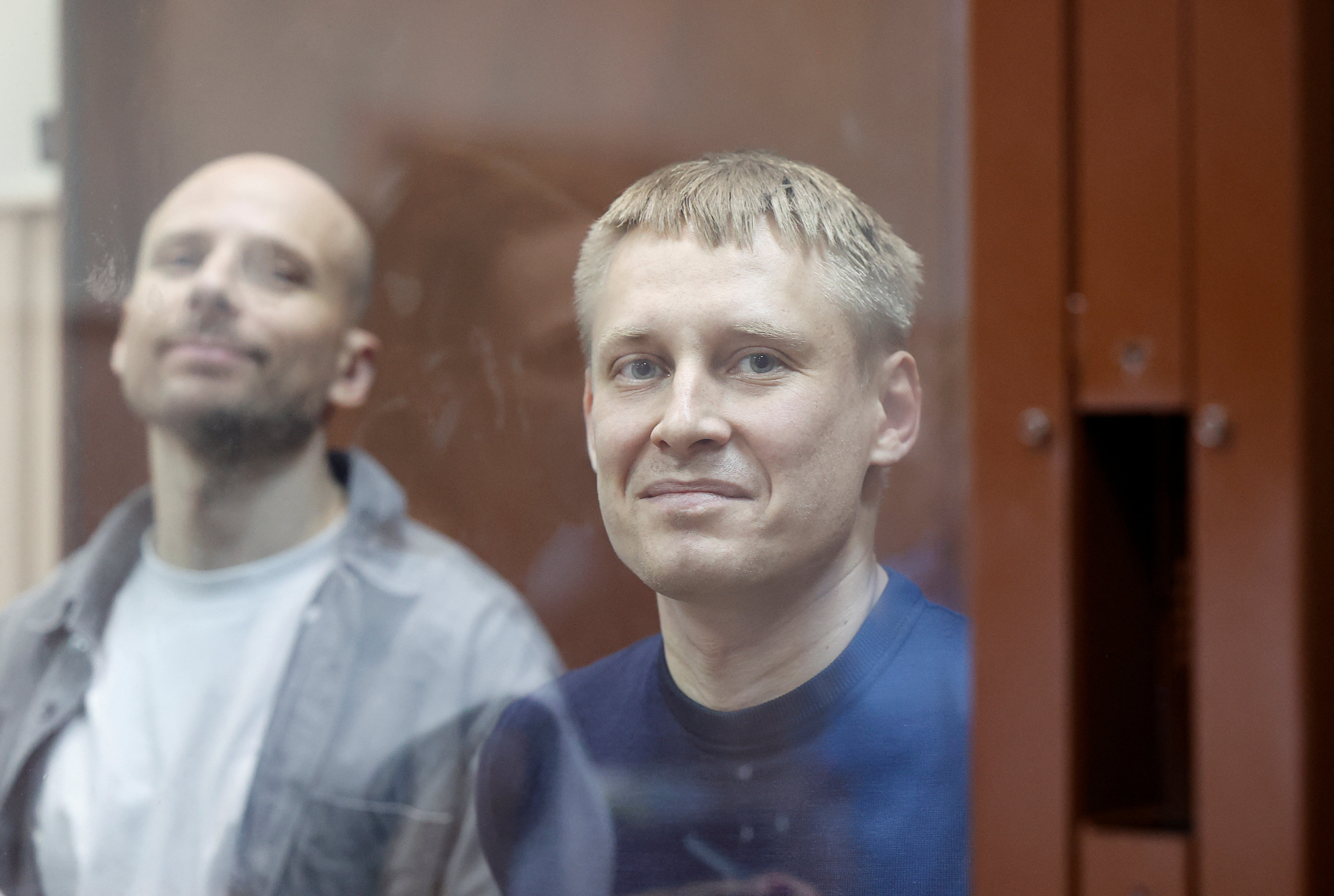 Russian court extends detention of two journalists