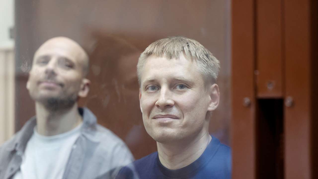 Russian court extends detention of two journalists