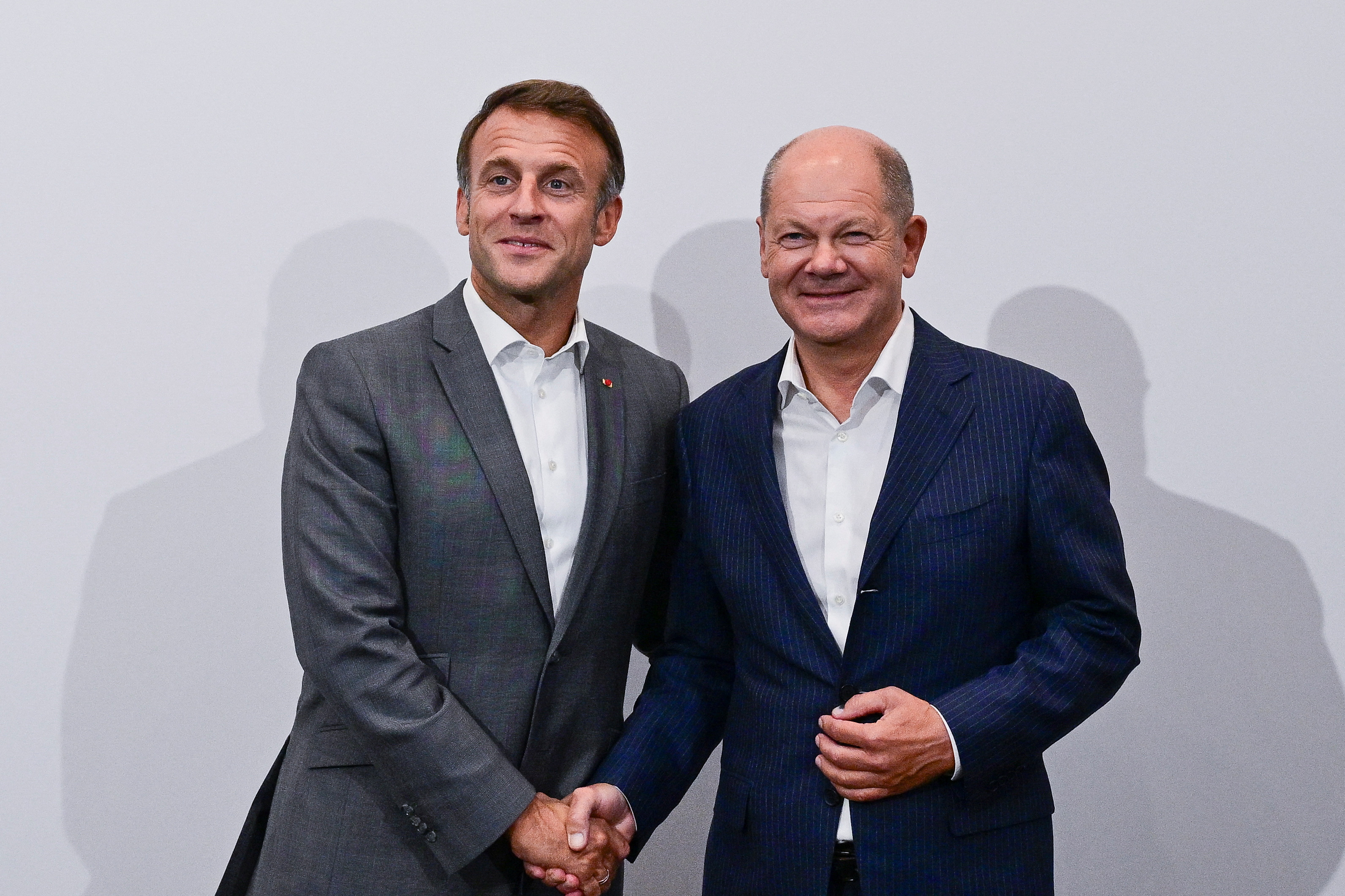 France's President Emmanuel Macron and Germany's Chancellor Olaf Scholz meet during the 33rd Evian Annual Meeting to promote economic cooperation at Evian
