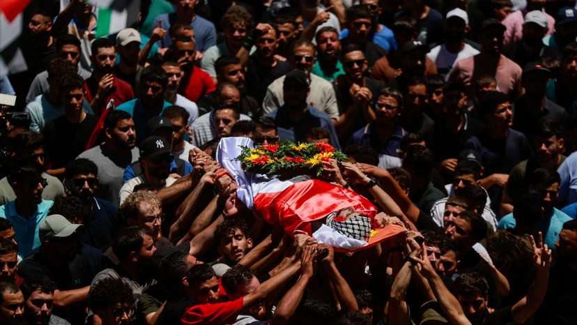 Mourners take part in the funeral of of Sayfollah Kamel Musallet, killed amid the Israel-Gaza conflict, near Ramallah