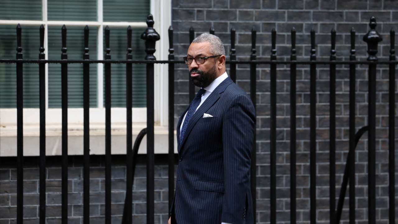 Britain's Foreign Secretary James Cleverly walks outside 10 Downing Street in London