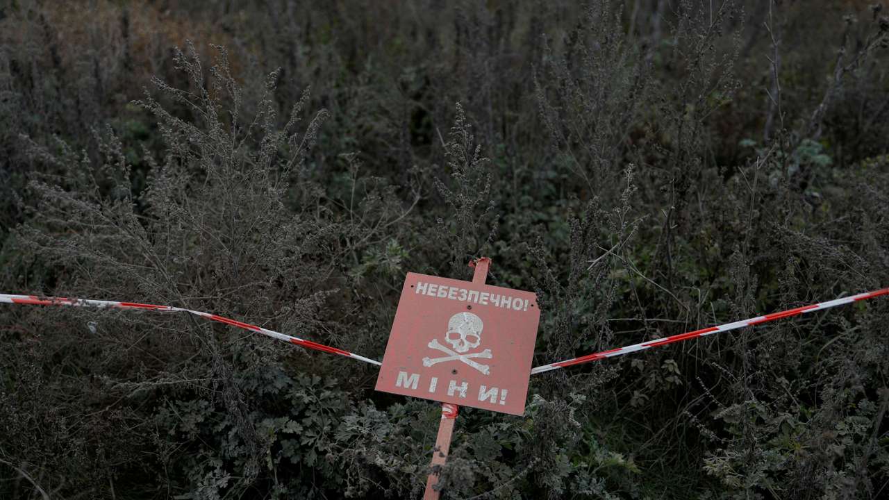 Ukrainian mine experts scan for unexploded ordnance and landmines Kherson region