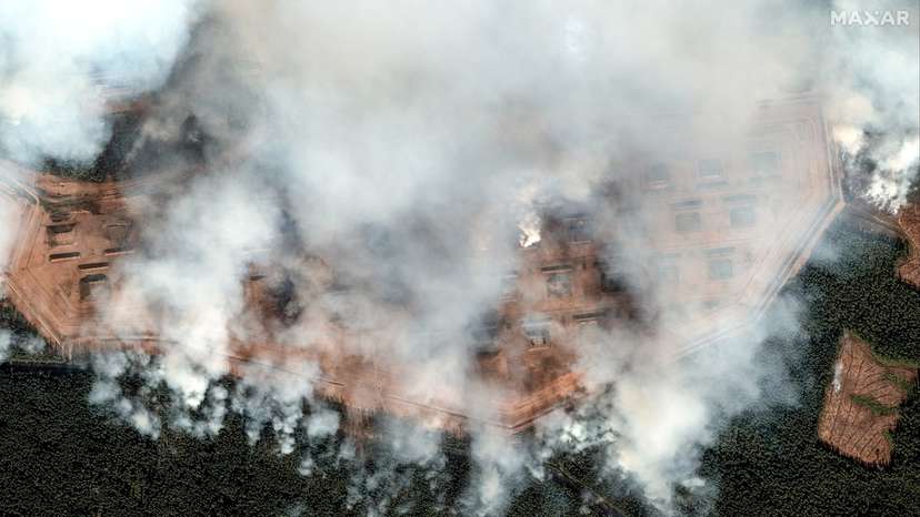 A satellite image shows ammunition bunkers on fire after the explosion, in Toropets
