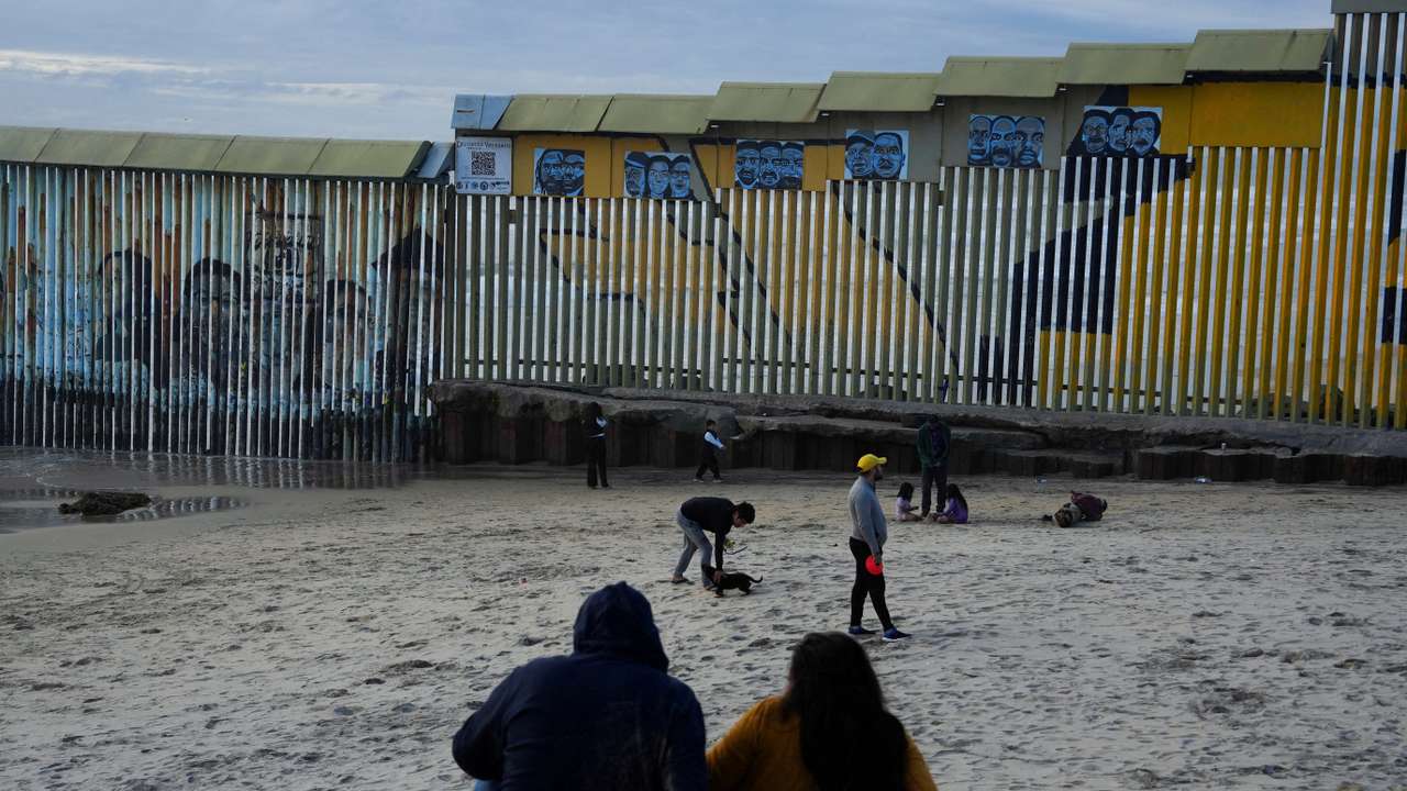 FILE PHOTO: People visit the border fence at Playas Tijuana