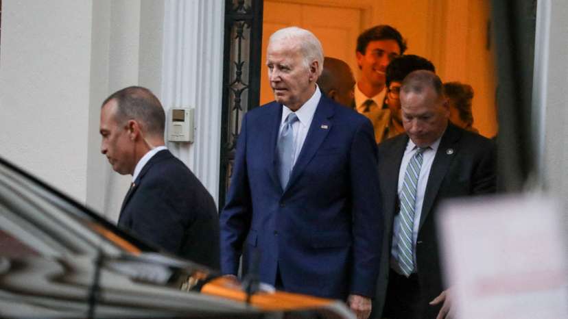 FILE PHOTO: U.S. President Joe Biden departs a Biden Victory Fund campaign fundraising event in the Kalorama neighborhood, in Washington