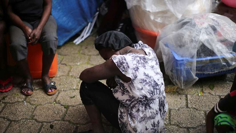 People fleeing violence take shelter in improvised encampments, in Port-au-Prince