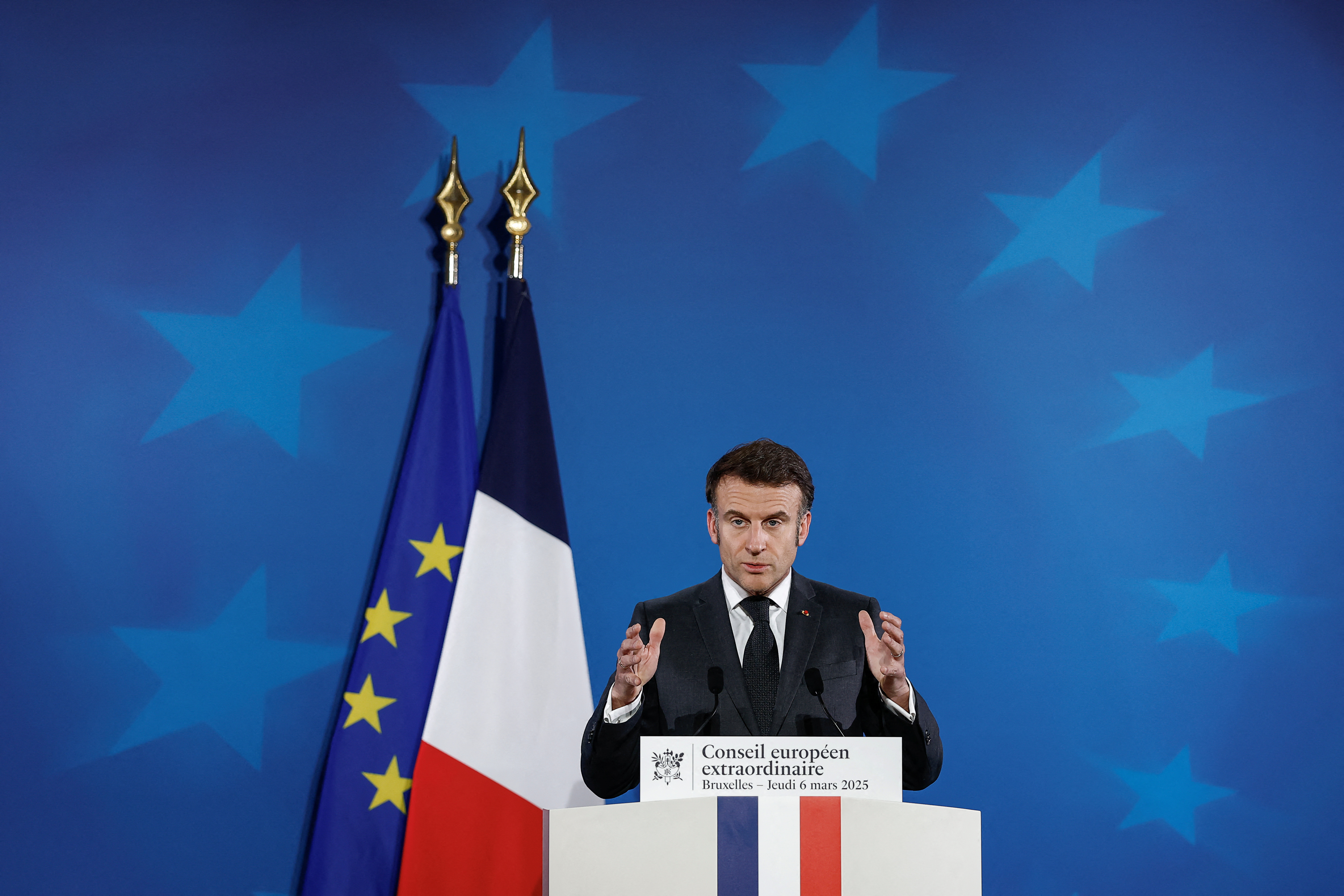 French President Emmanuel Macron attends a press conference, in Brussels