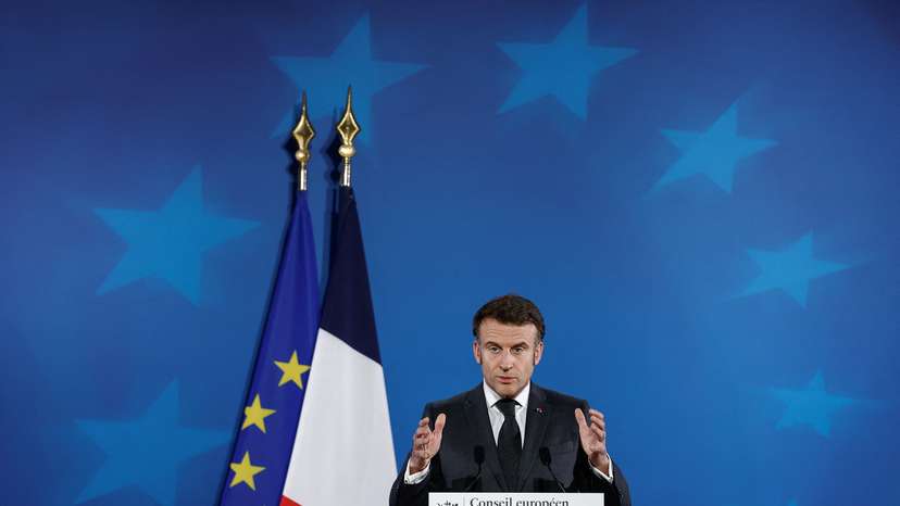 French President Emmanuel Macron attends a press conference, in Brussels