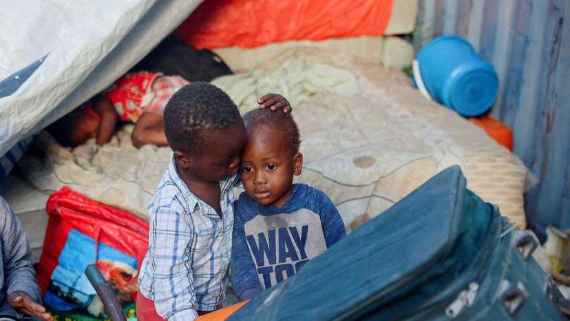 FILE PHOTO: People who fled their homes due to gang violence take shelter inside Haiti's Ministry of Public Works building in Port-au-Prince