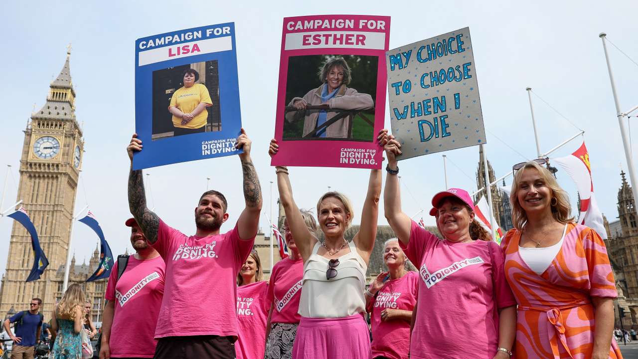 People react after Britain's parliament voted in favour of a bill to legalise assisted dying, London