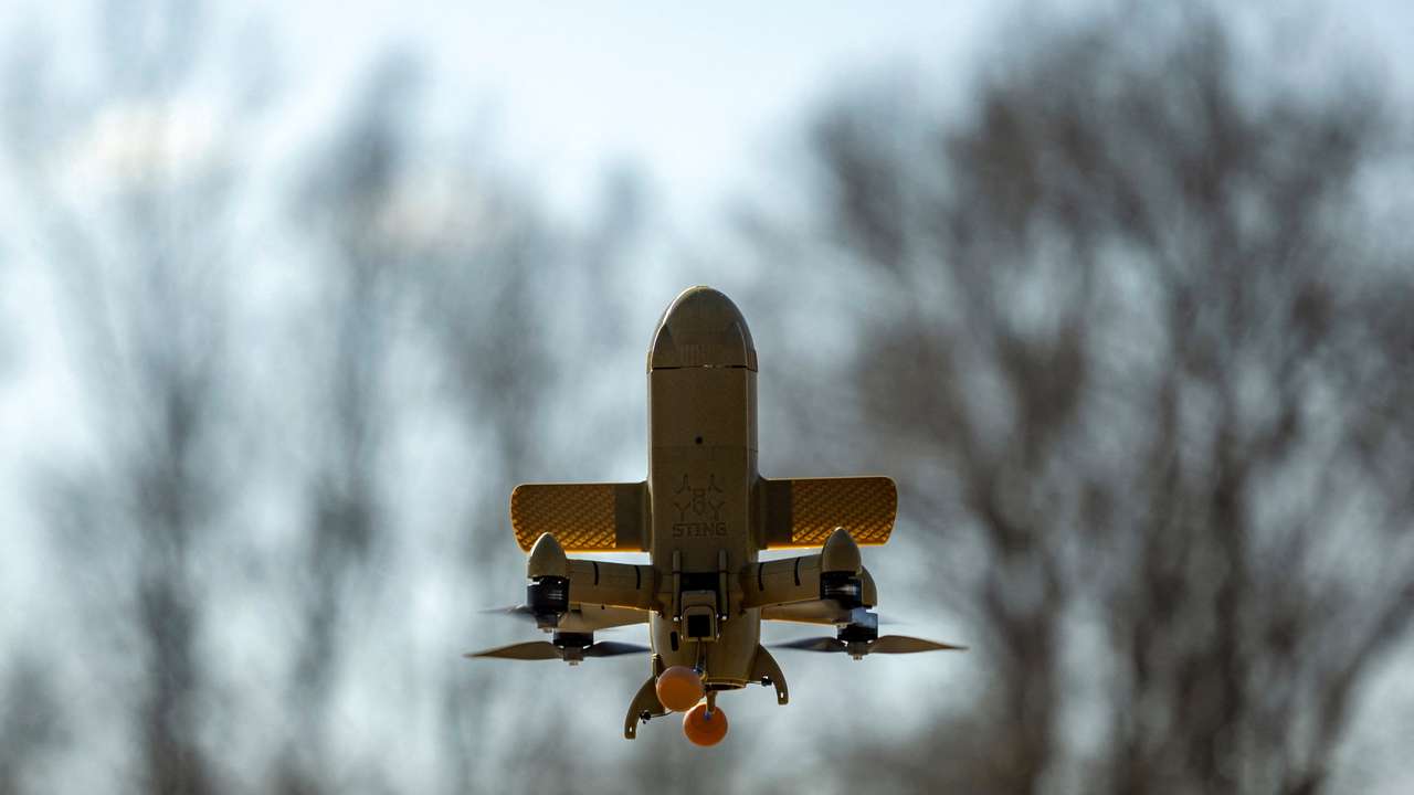 Wild Hornets engineers demonstrate Ukrainian Sting interceptor drones in Ukraine