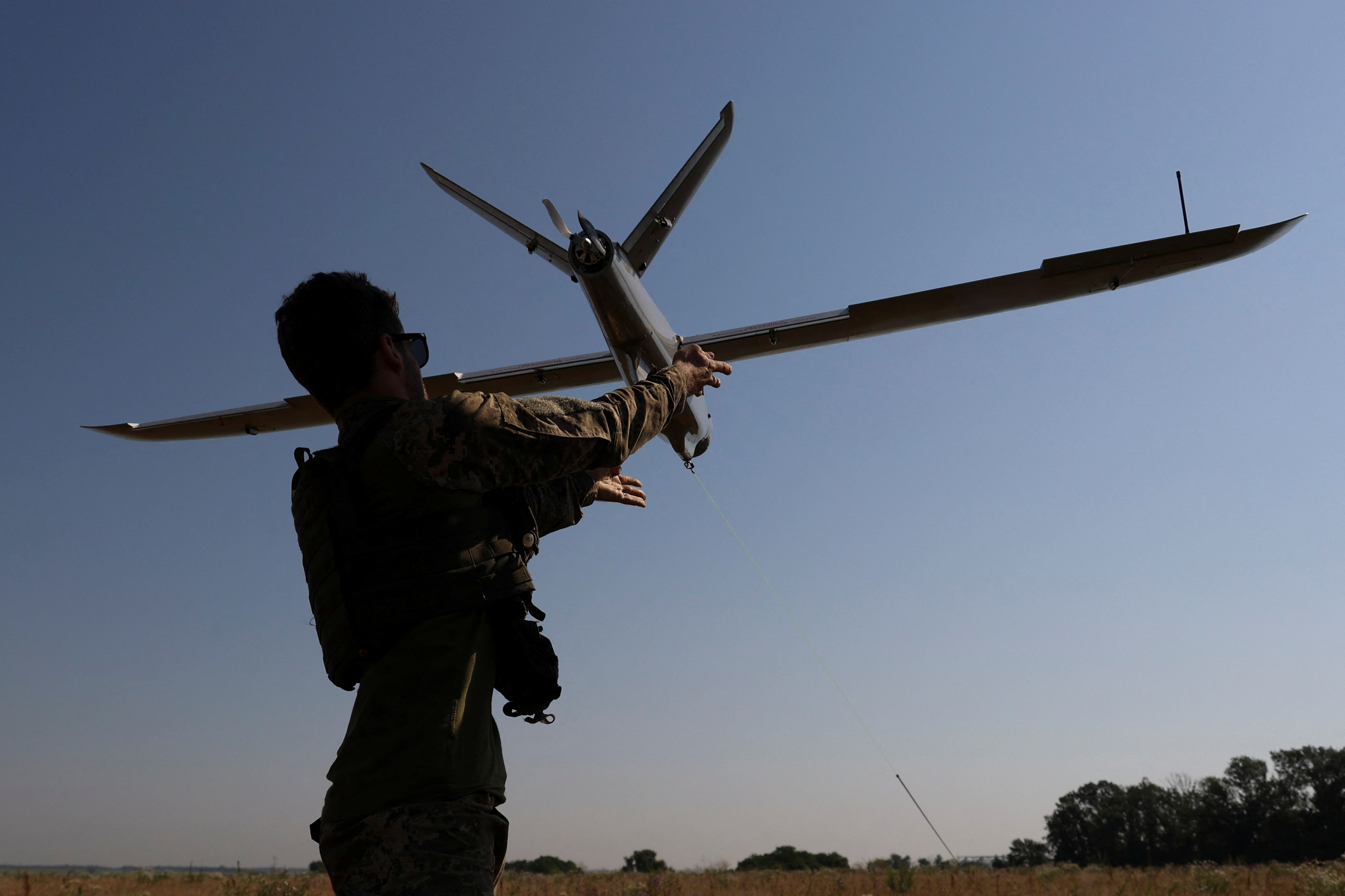 Ukrainian servicemen operate a reconaissance UAV near a front line in Donetsk region