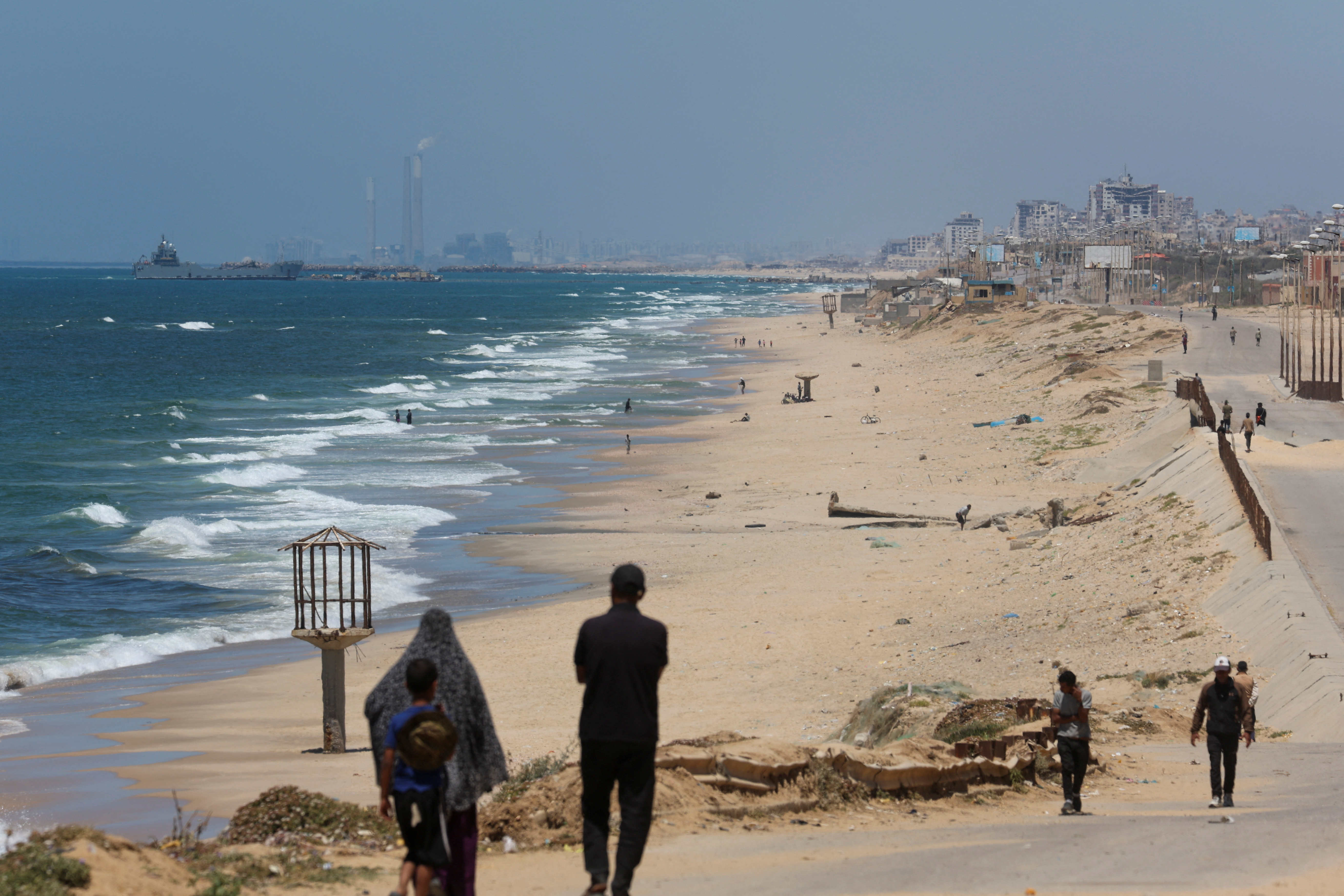 Temporary floating pier anchored by the U.S. to boost aid deliveries to Gaza