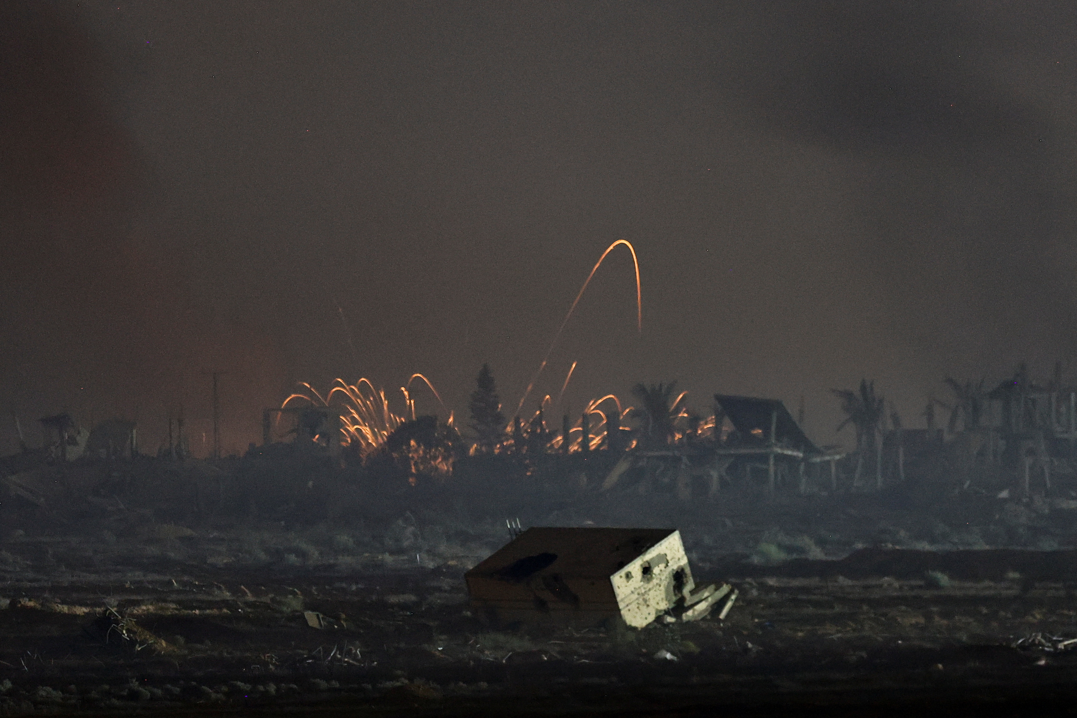 An explosion in Gaza is seen from the Israeli side of the Israel-Gaza border