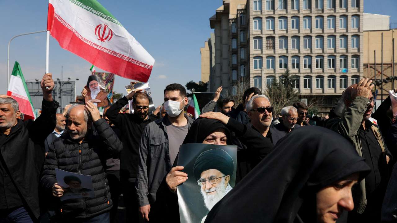 People attend an anti-Israeli and U.S rally in Tehran