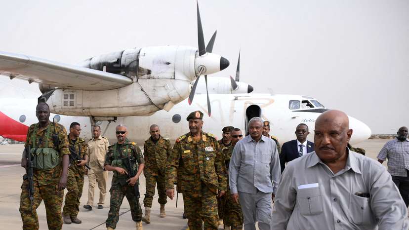 FILE PHOTO: Sudan's military ruler Burhan arrives to the city of Port Sudan on his first trip away following the crisis in Sudan capital Khartoum