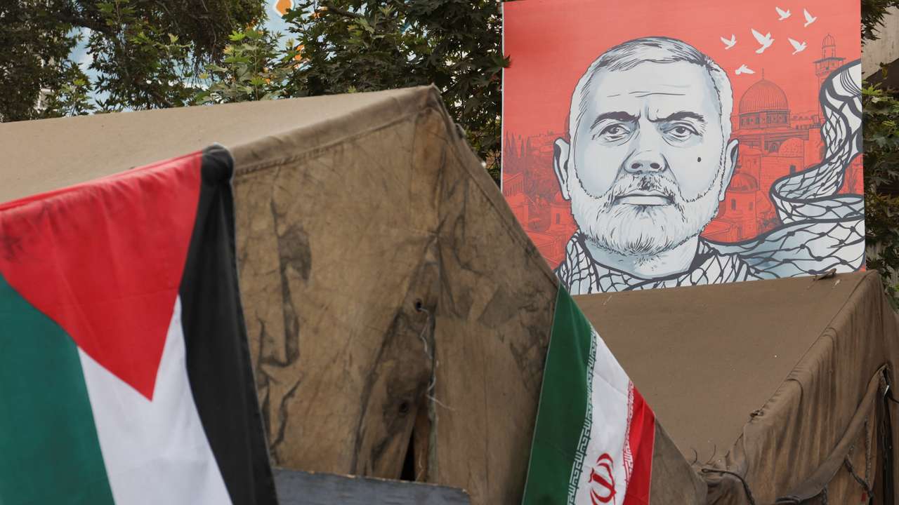 A banner with a picture of late Hamas leader Ismail Haniyeh is displayed in Tehran