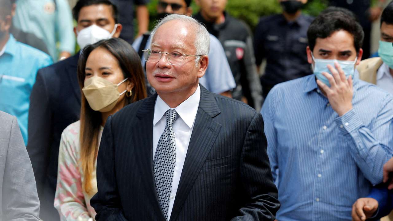 FILE PHOTO: Former Malaysian Prime Minister Najib Razak walks out from the Federal Court during a court break, in Putrajaya