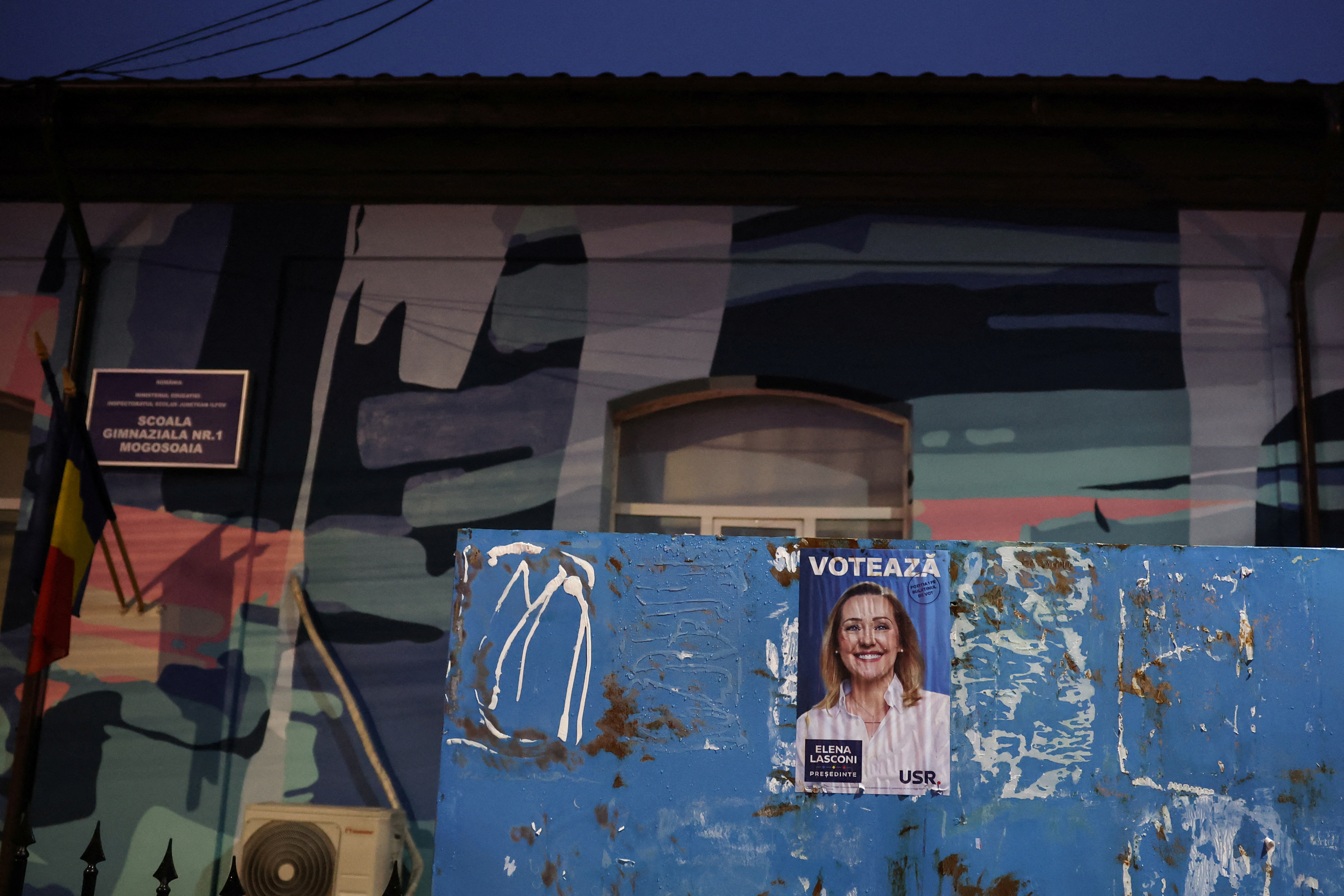 A pre-election poster of Leader of center-right opposition Save Romania Union (USR) Elena Lasconi is seen in Mogosoaia