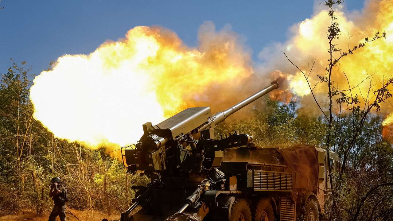 A Ukrainian serviceman fires a self-propelled howitzer towards Russian troops in Zaporizhzhia region