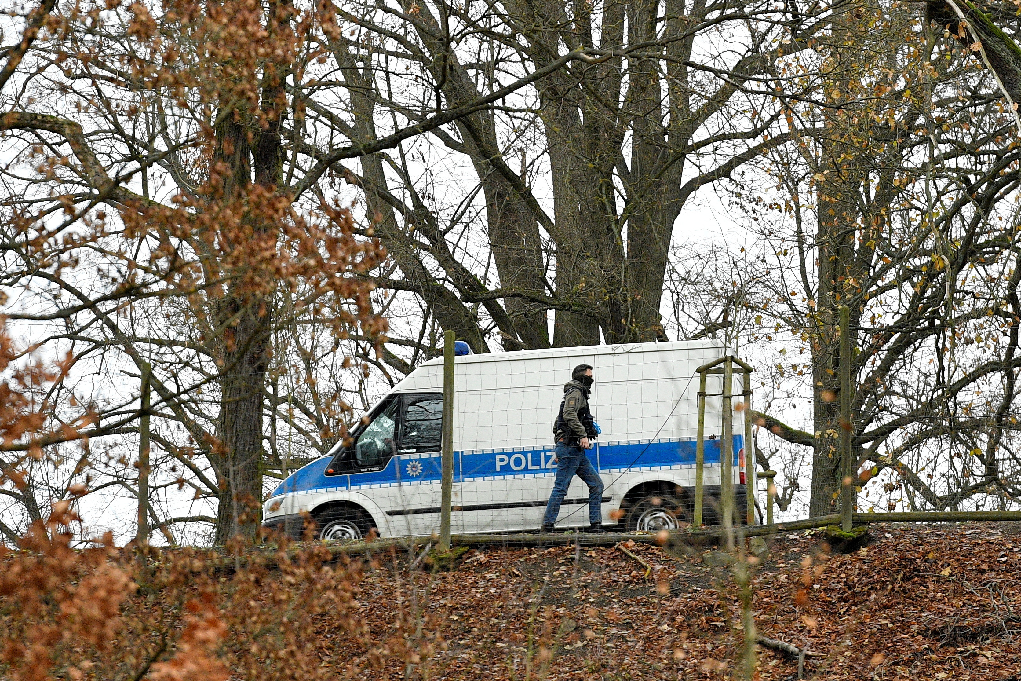 FILE PHOTO: Police secure the area around the Waidmannsheil hunting lodge, in Saaldorf