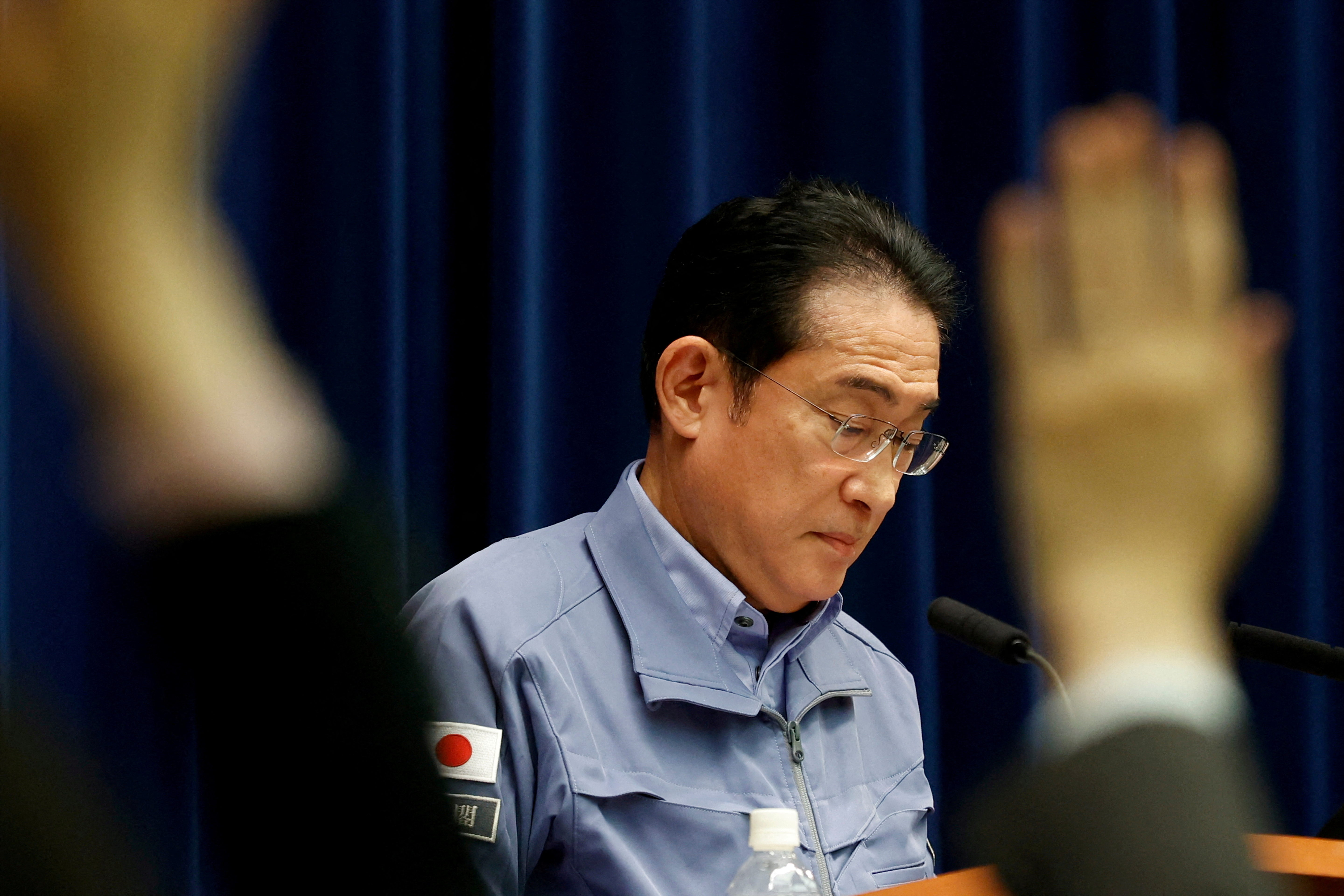 FILE PHOTO: Japanese PM Fumio Kishida holds a press conference in Tokyo