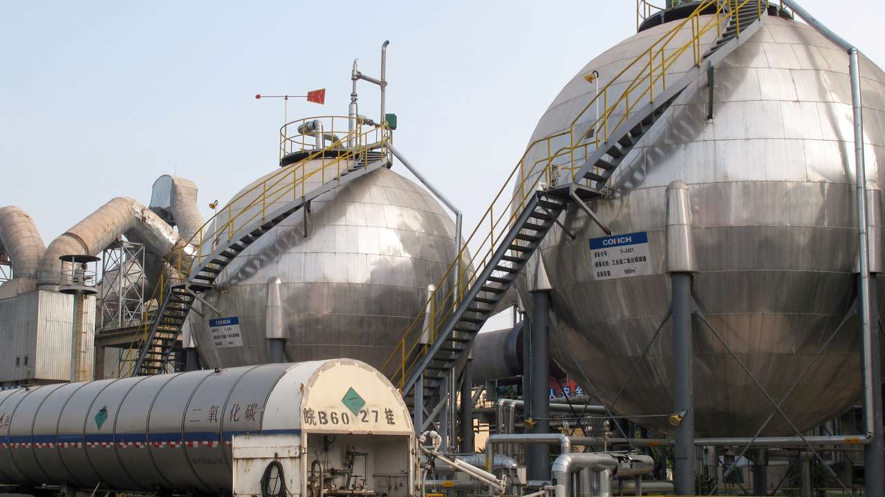 FILE PHOTO: Carbon dioxide storage tanks are seen at a cement plant and carbon capture facility in Wuhu