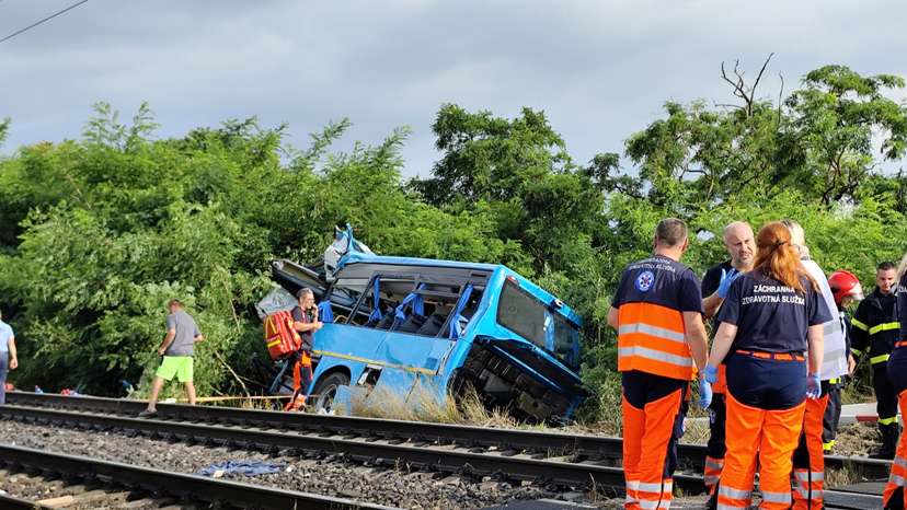 Emergency personnel work at the site of a crash near Nove Zamky