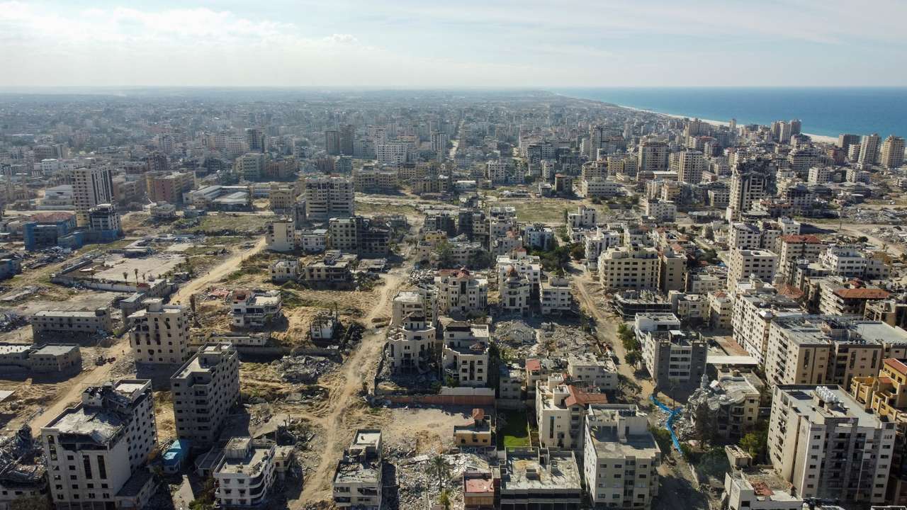 A drone view shows damaged and destroyed buildings, following a ceasefire between Israel and Hamas, in Gaza City