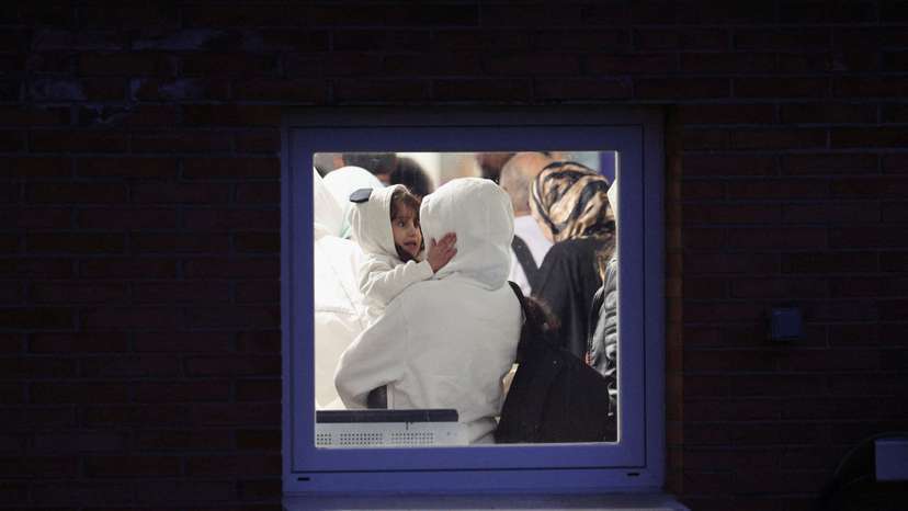 Spanish-Palestinians and Palestinians evacuated from Gaza arrive at a military base outside Madrid
