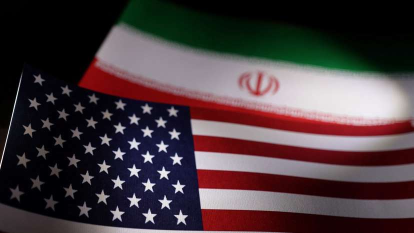 Illustration shows U.S. and Iranian flags