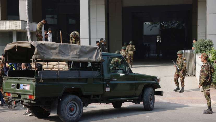 Members of Bangladesh Army arrive at a temporary camp in order to help civil administration during general election in Dhaka
