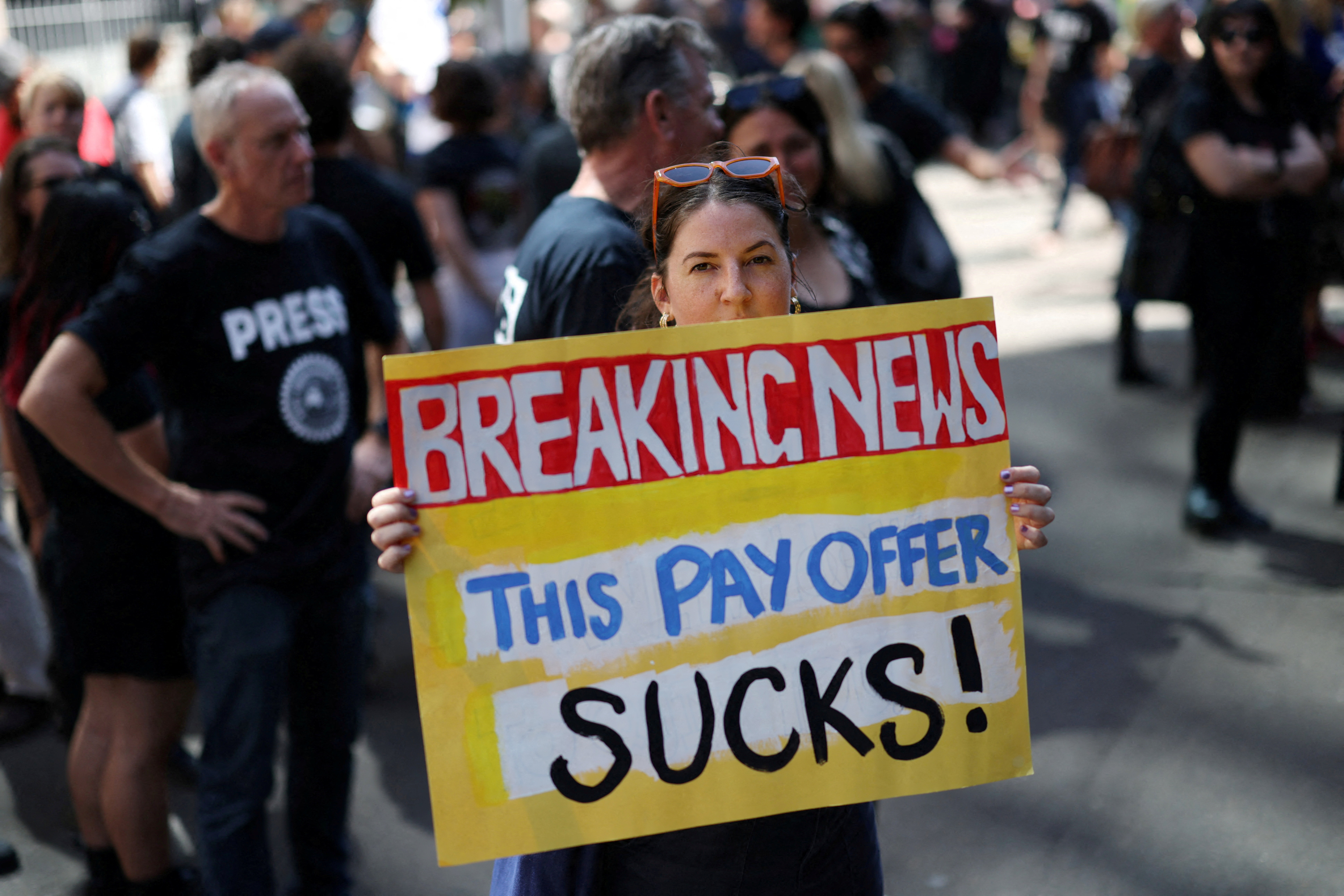 ABC staff and journalists strike outside the national broadcaster’s headquarters in Sydney