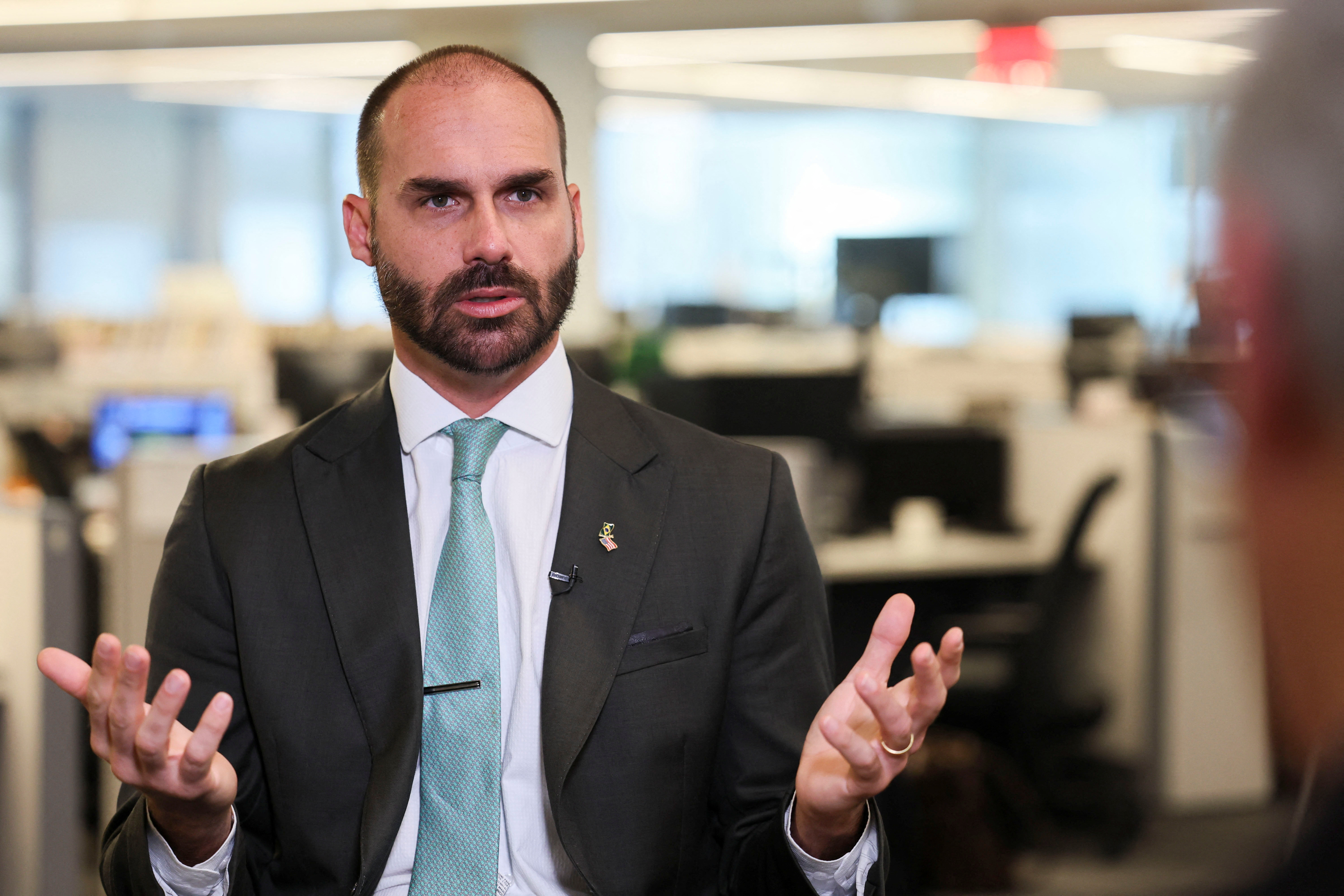 FILE PHOTO: Brazilian lawmaker Eduardo Bolsonaro sits down with Reuters to discuss his efforts to put U.S. pressure on Brazil to halt the trial of his father, right-wing former Brazilian President Jair Bolsonaro, in Washington, D.C.