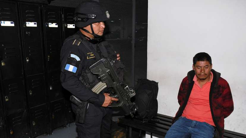 FILE PHOTO: Guatemalan law enforcement arrested Rigoberto Ramon Miranda Orozco, who is charged in the U.S. with conspiring to smuggle four migrants, in Guatemala City