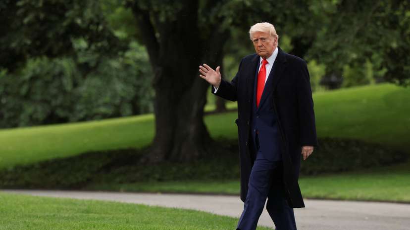 U.S. President Donald Trump walks as he departs the White House to attend his meme coin gala at the Trump National Golf Club