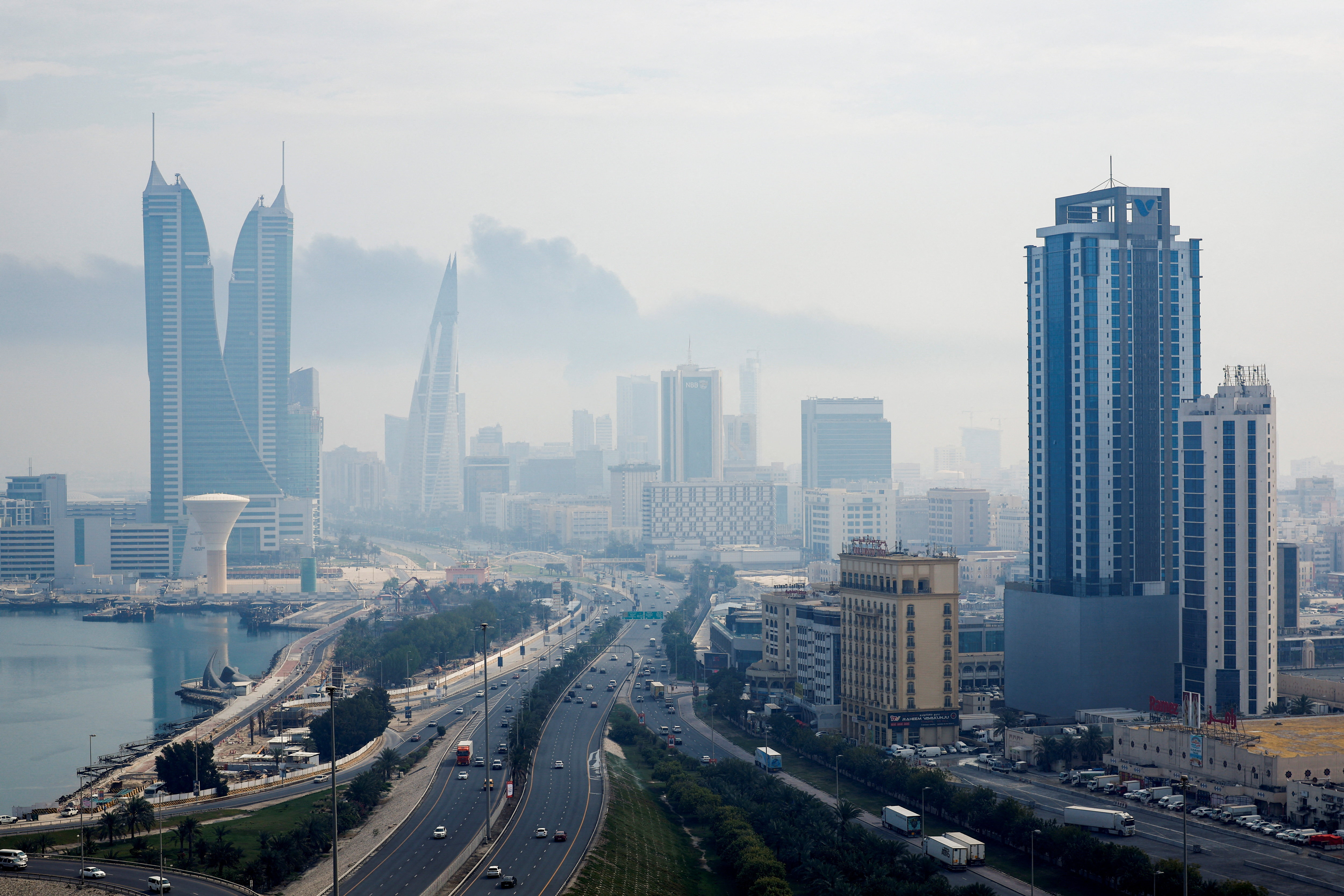 Smoke rises following a strike on Bahrain airport on Muharraq Island