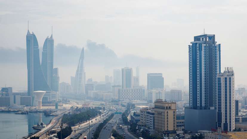 Smoke rises following a strike on Bahrain airport on Muharraq Island