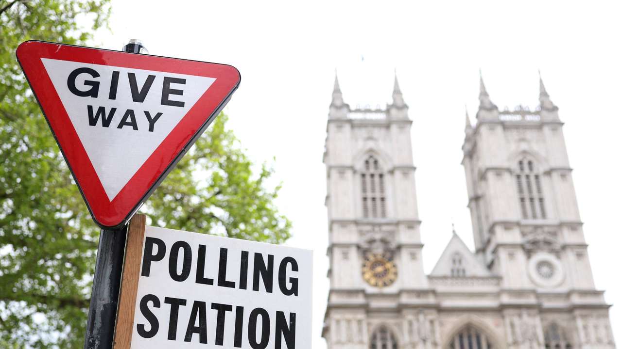 FILE PHOTO: Polling station sign seen ahead of local elections, in London