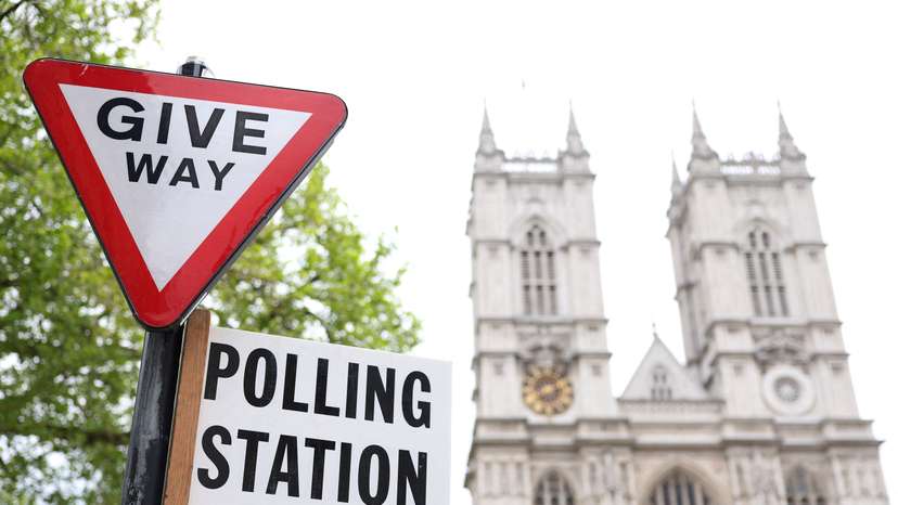 FILE PHOTO: Polling station sign seen ahead of local elections, in London