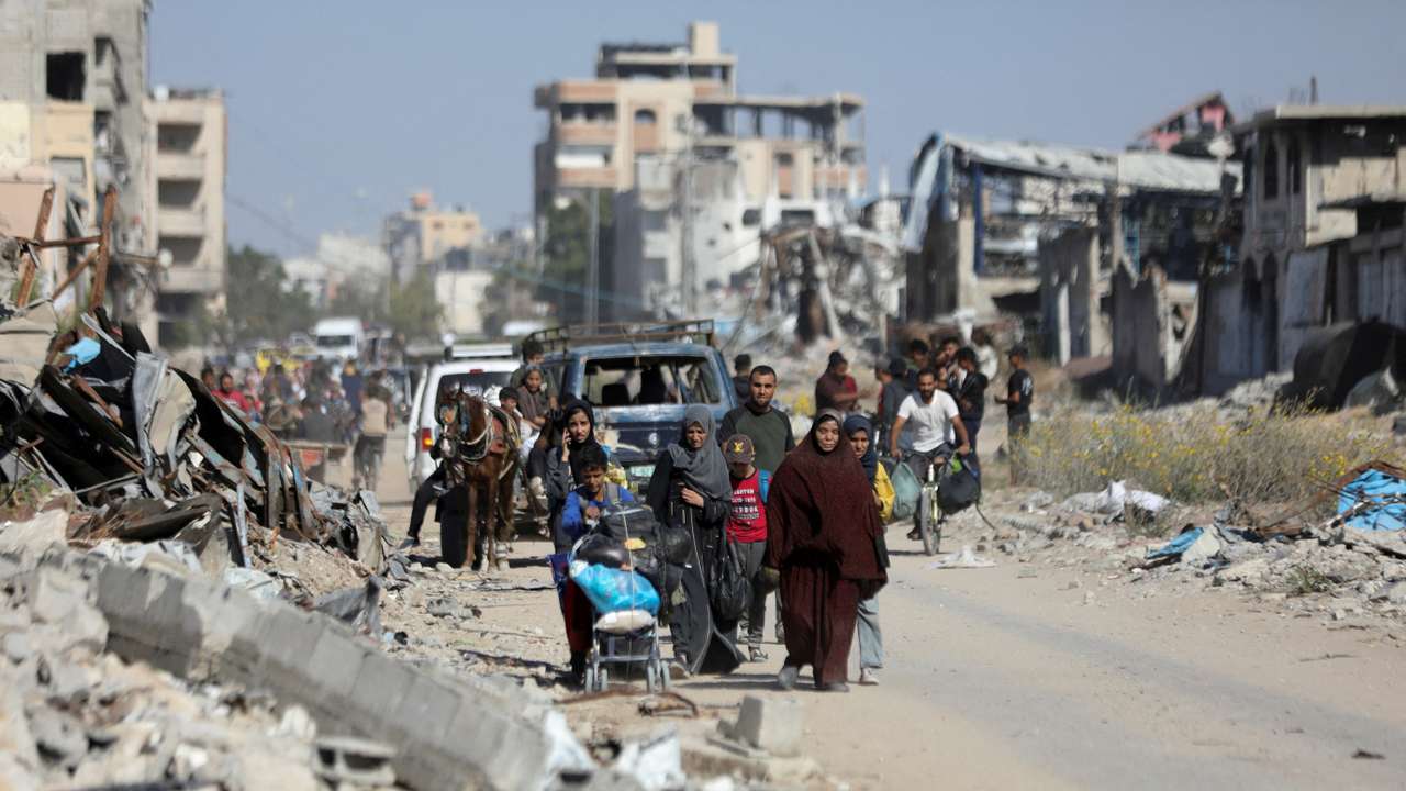 Displaced Palestinians flee the northern part of Gaza amid an Israeli military operation, in Jabalia in the northern Gaza Strip