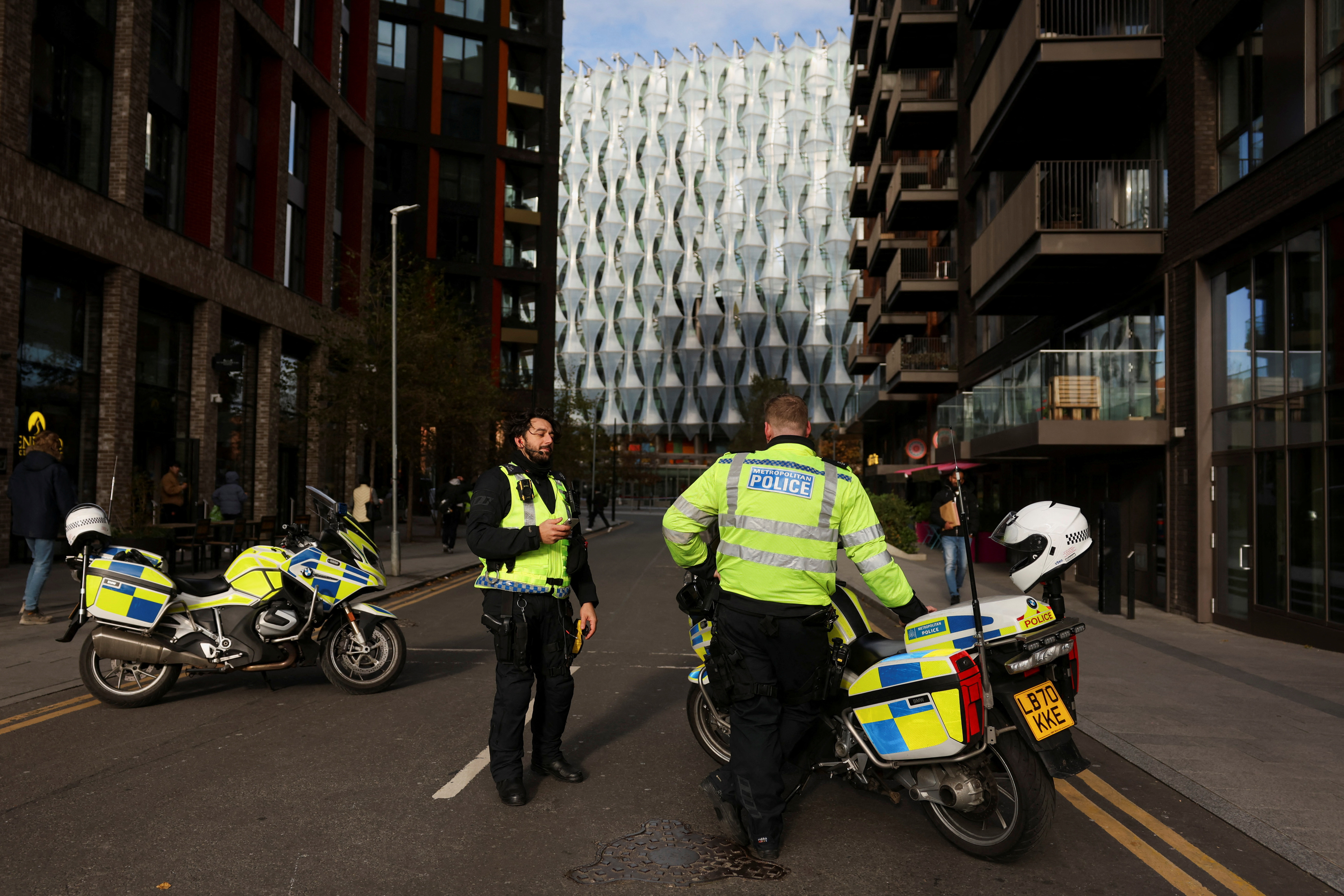 Police investigate an incident, in London