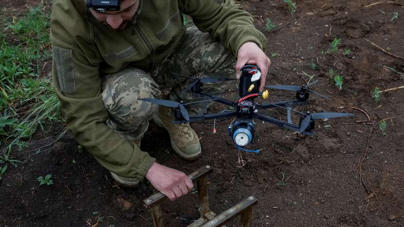 FILE PHOTO: Ukrainian service members prepare FPV drones during the unilaterally proposed three-day ceasefire declared by Russia, near a frontline in Dnipropetrovsk region