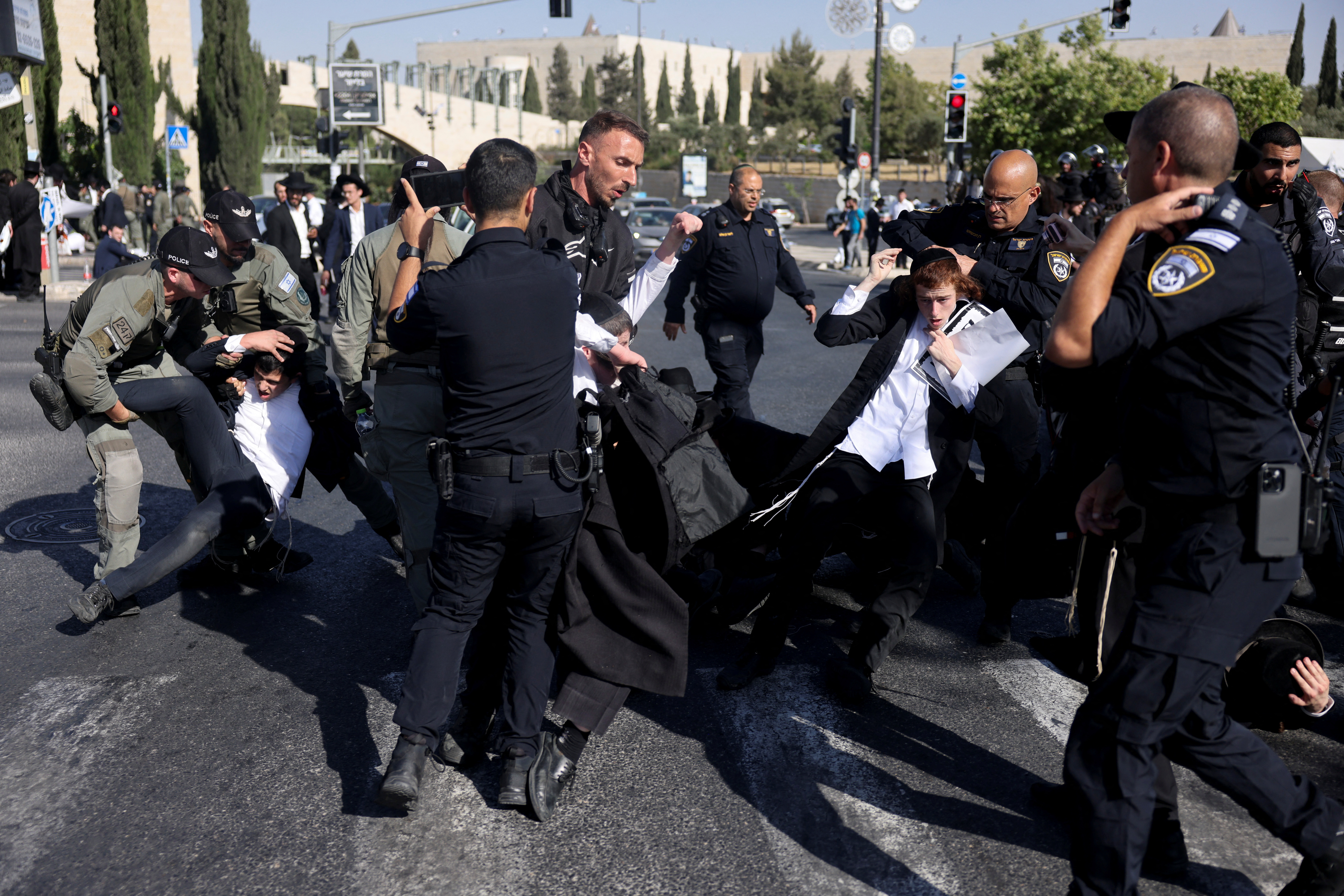 Ultra-Orthodox Jews protest against plans for conscription discussed by Israel's Supreme Court