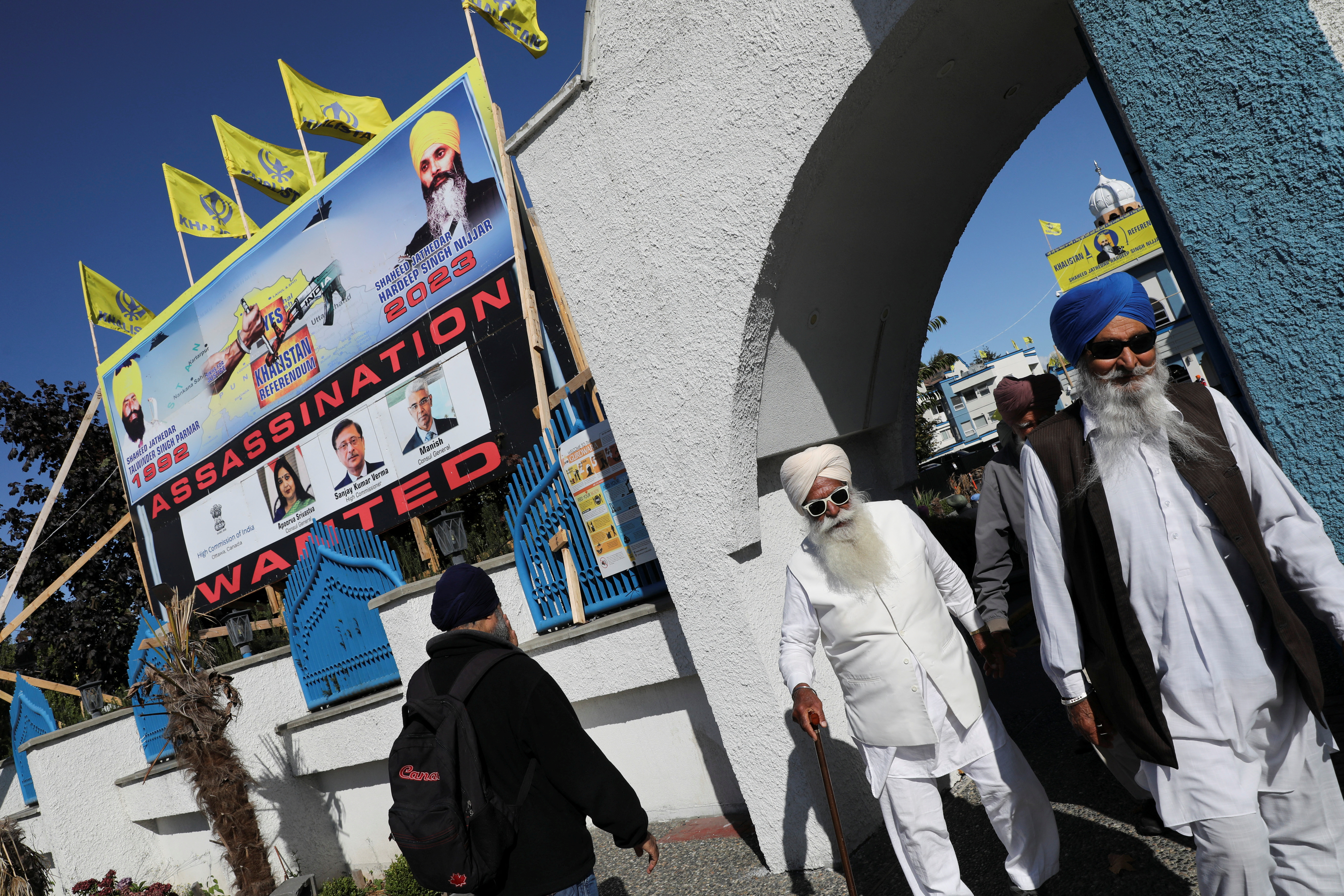 A sign outside the Guru Nanak Sikh Gurdwara temple is seen after the killing on its grounds in June 2023 of Sikh leader Hardeep Singh Nijjar, in Surrey