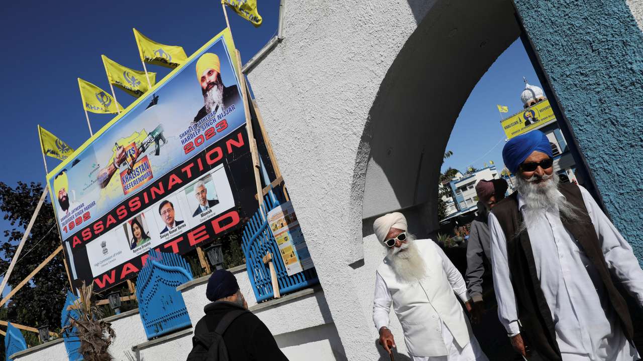 A sign outside the Guru Nanak Sikh Gurdwara temple is seen after the killing on its grounds in June 2023 of Sikh leader Hardeep Singh Nijjar, in Surrey