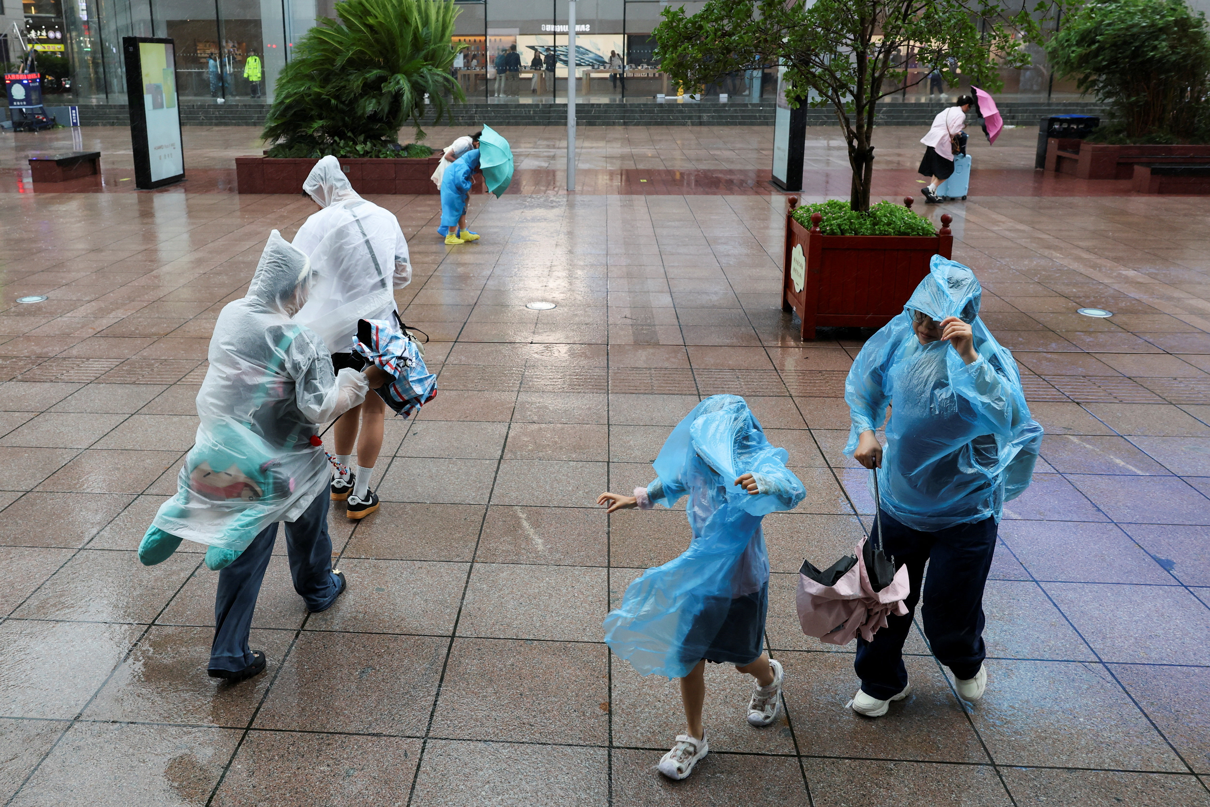 Heavy rain and high winds in Shanghai after Tropical Storm Co-May made landfall in a nearby city