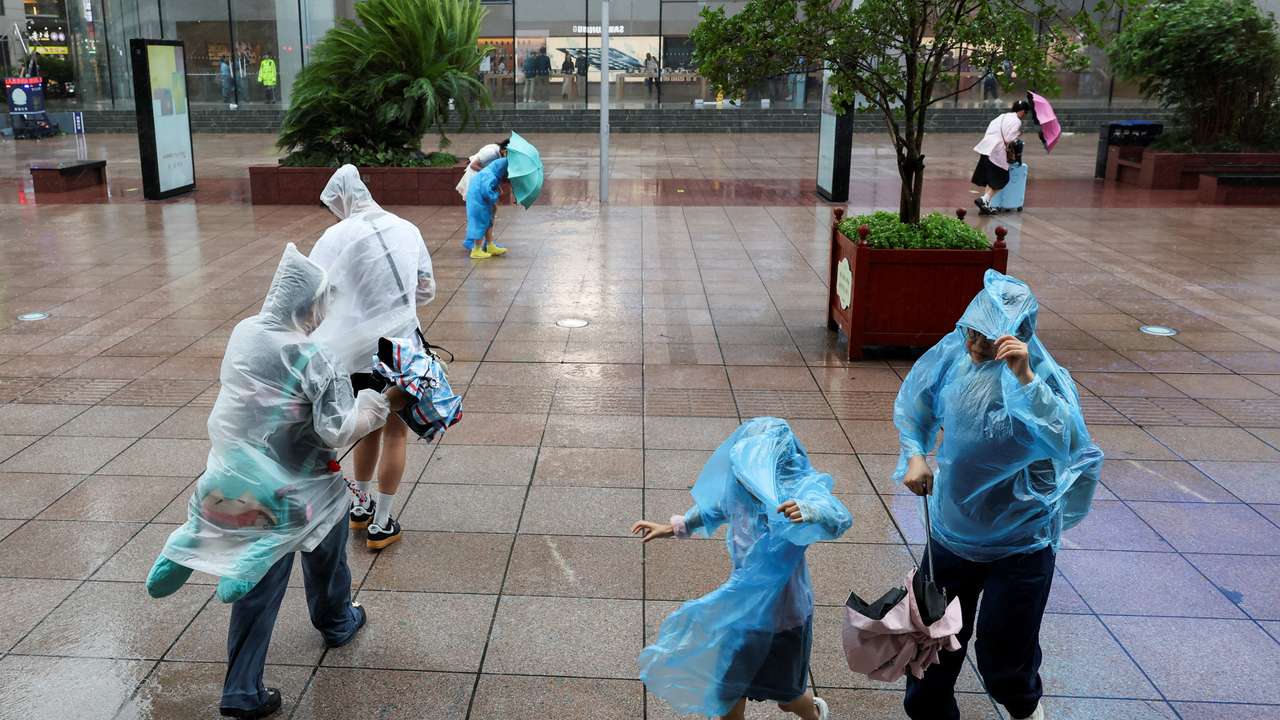 Heavy rain and high winds in Shanghai after Tropical Storm Co-May made landfall in a nearby city