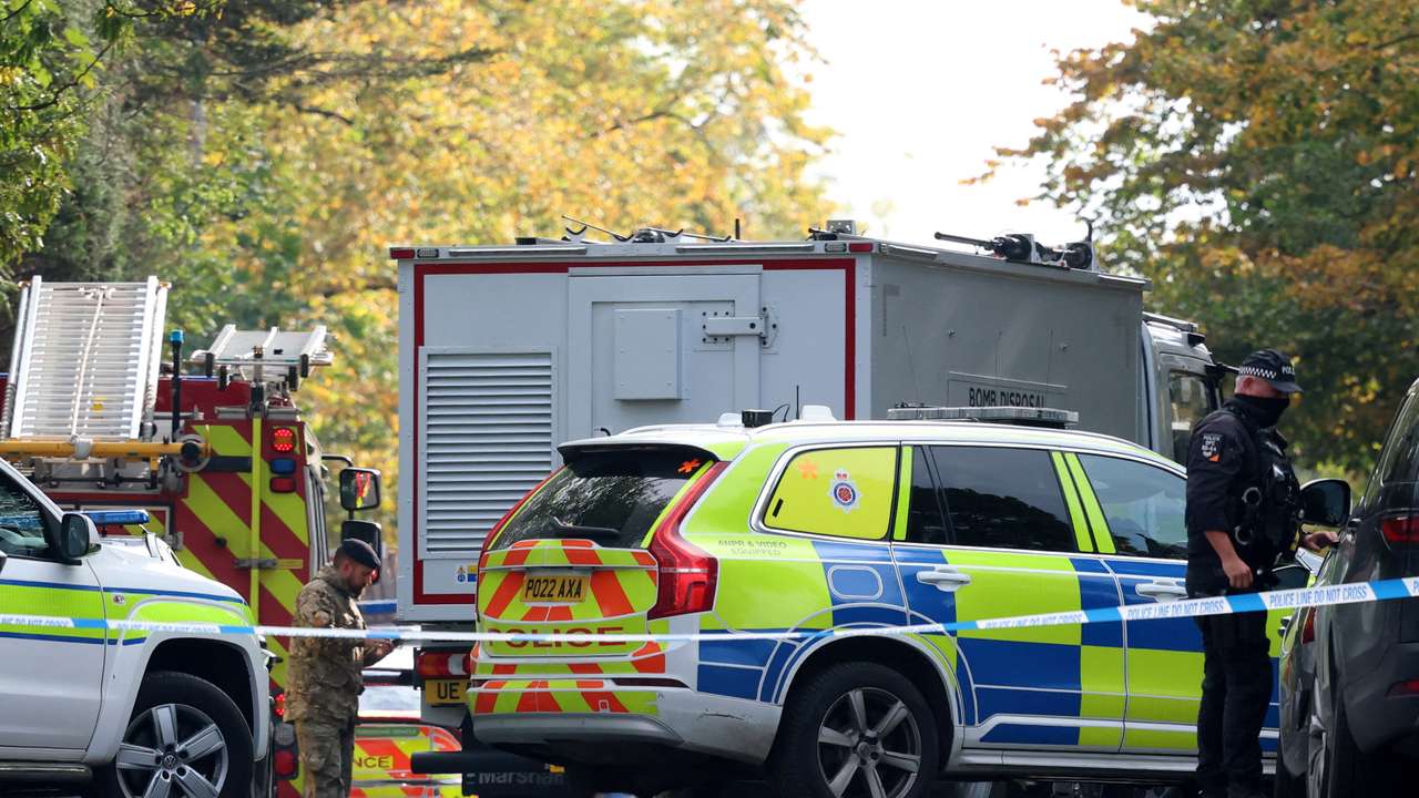 Emergency personnel work at the scene following an incident outside a synagogue, in Manchester