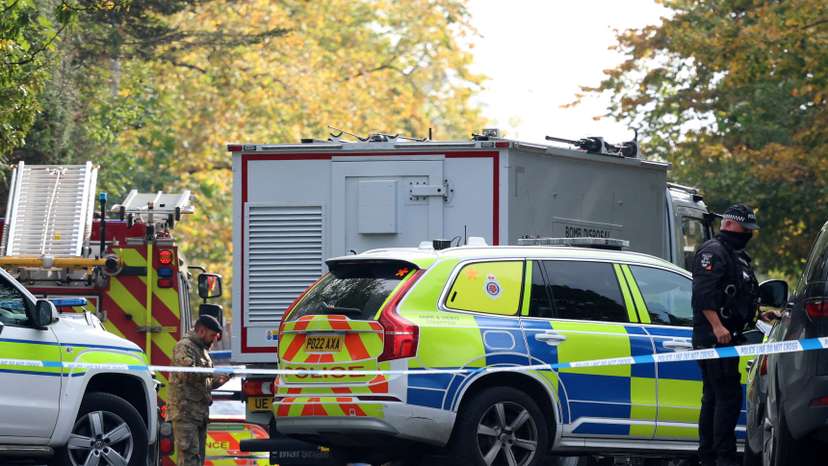 Emergency personnel work at the scene following an incident outside a synagogue, in Manchester